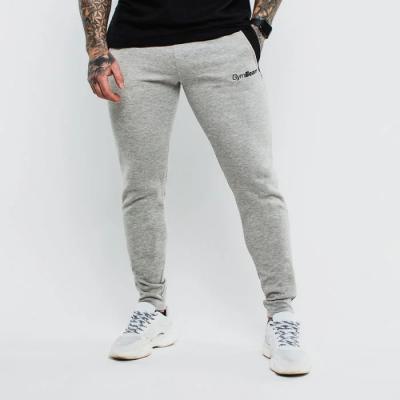 GymBeam Tepláky Slimfit Grey  L